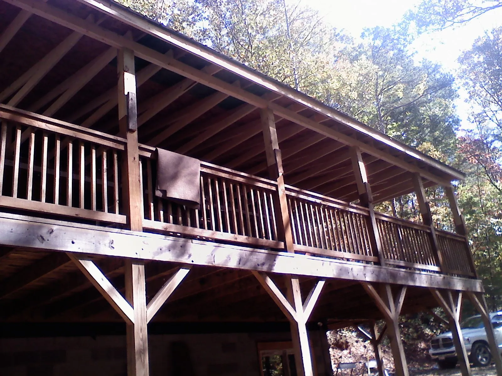 Timber framing under a new elevated porch and deck — Roof Leak Repair in Evadale by Roofing Brothers